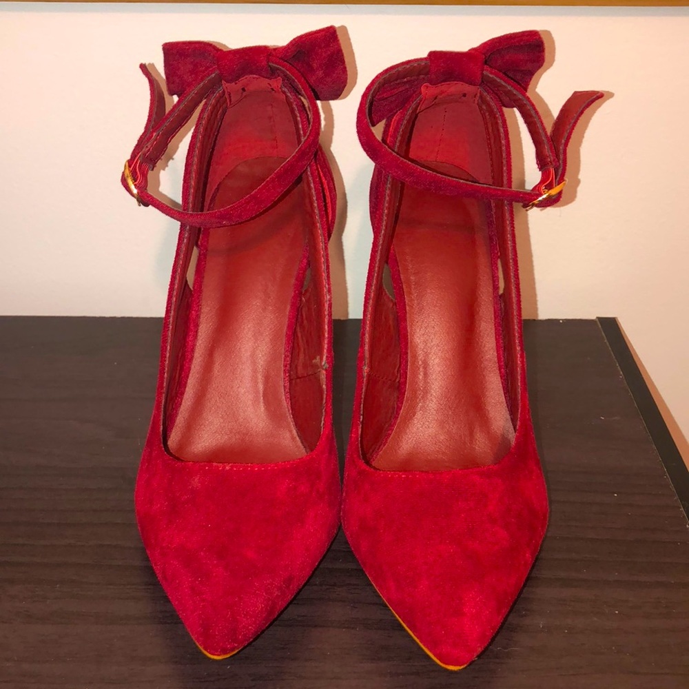 Pointed toe red heels with ankle strap